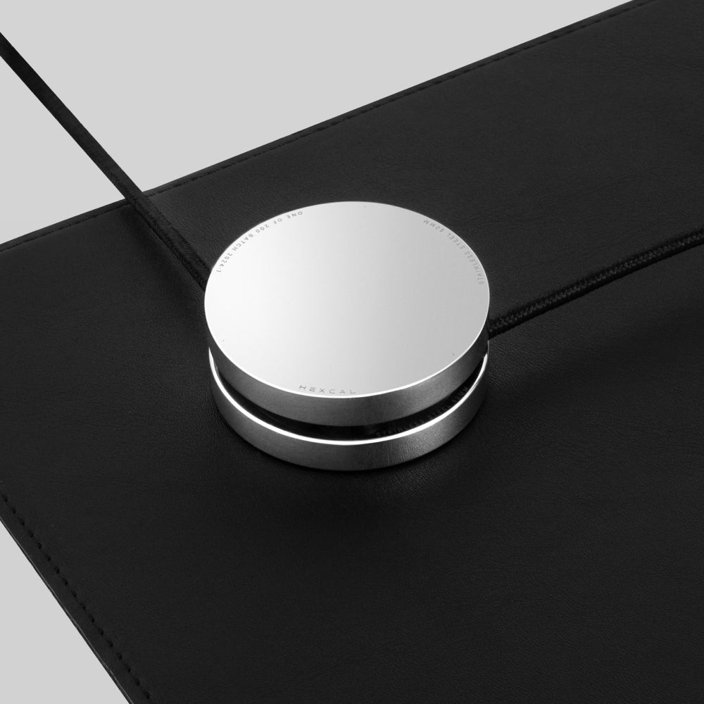 Hexcal 2-piece Stainless Steel Cable Organizer, perfect for securing a single cable while adding elegance to your workspace.