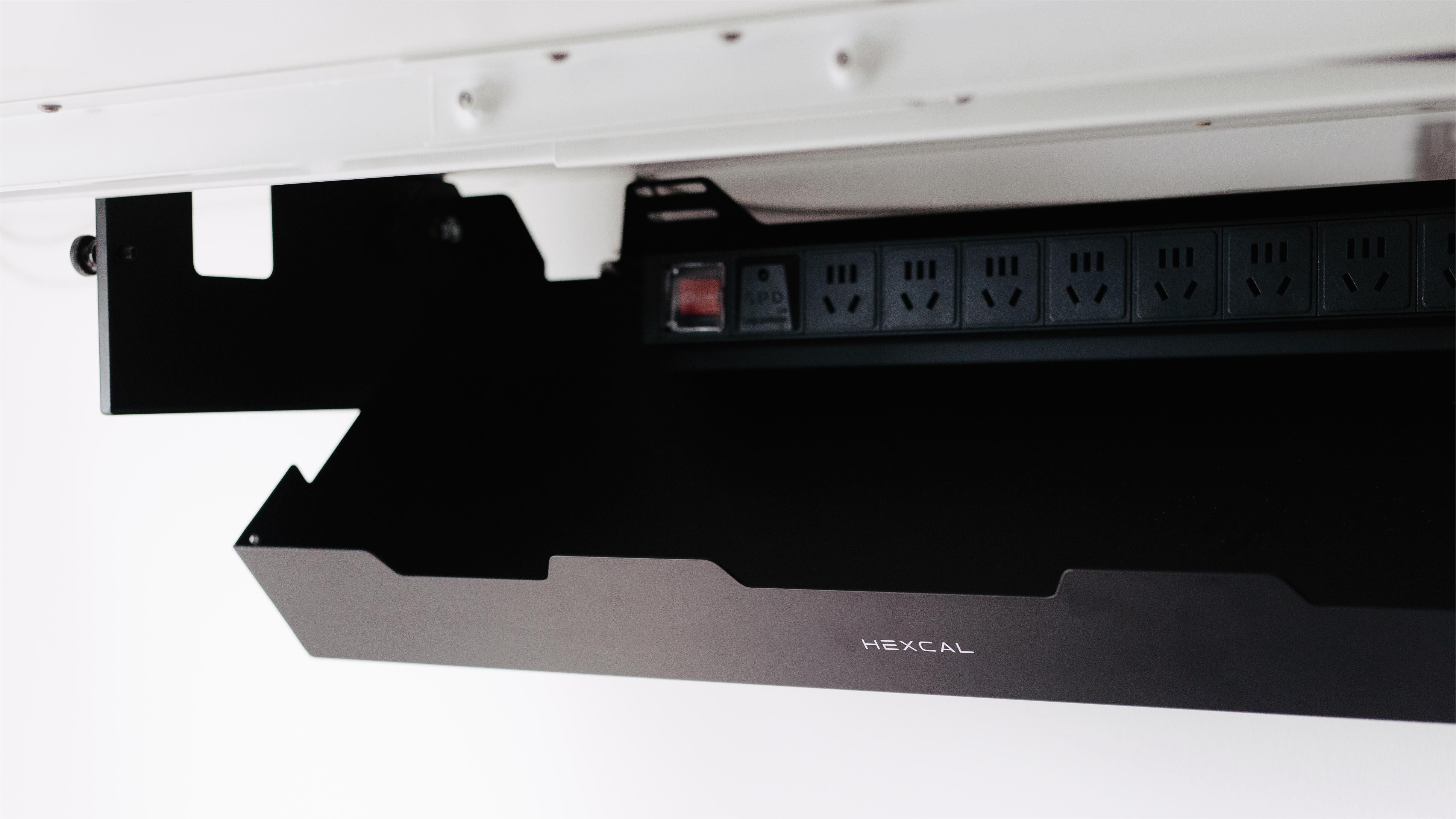 Consider installing a cable management tray under your desk to keep wires tucked away, preventing tangling and creating a more streamlined environment.