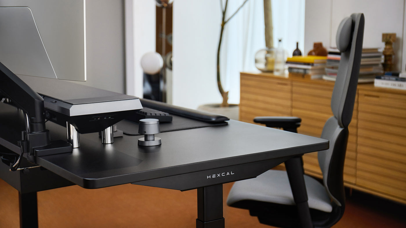 The Hexcal Elevate standing desk with Hexcal Inspire chair