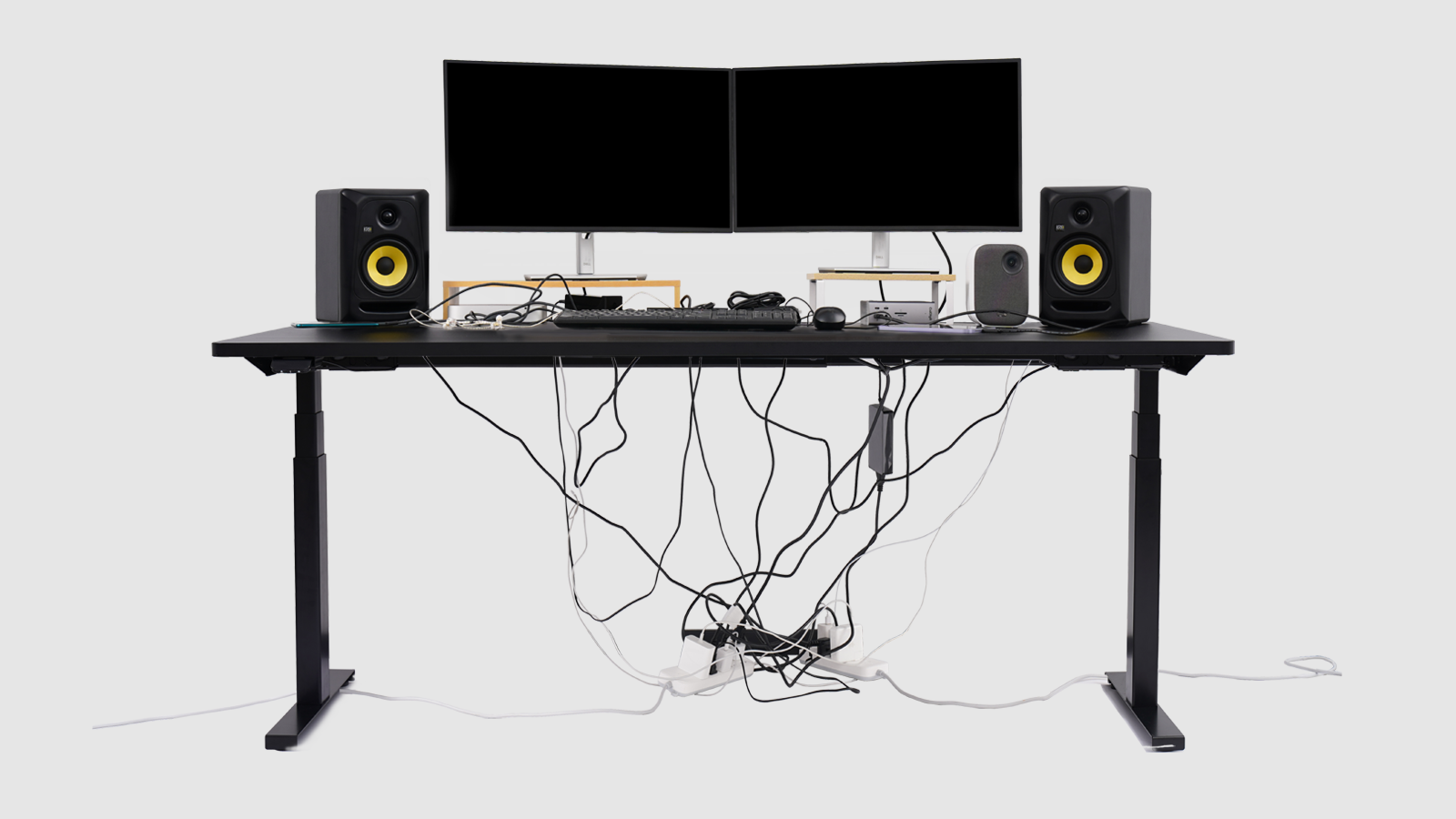 Before using Hexcal Studio monitor stand, the desk is messy and chaotic.