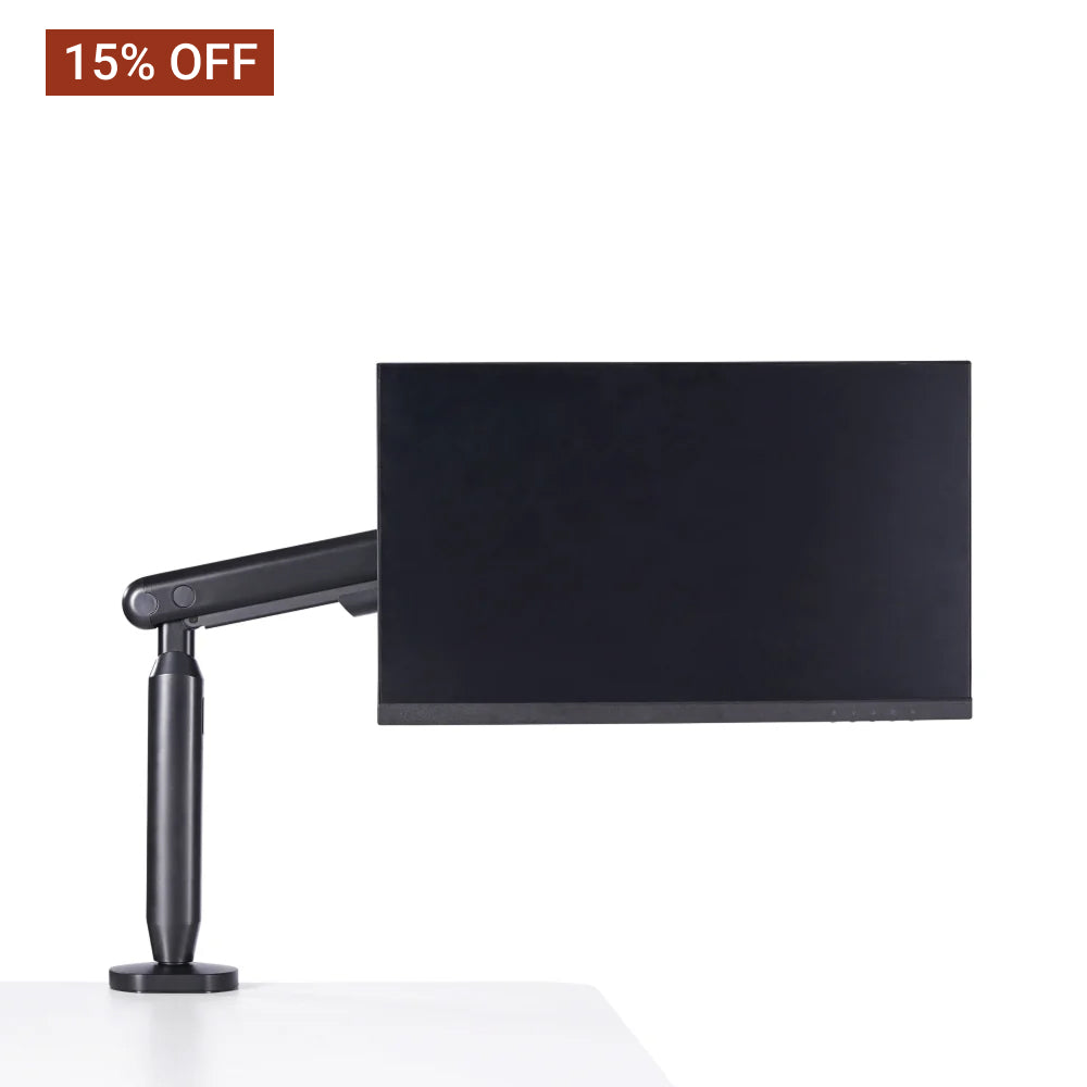 Hexcal Single Monitor Arm holds a monitor on a desk.