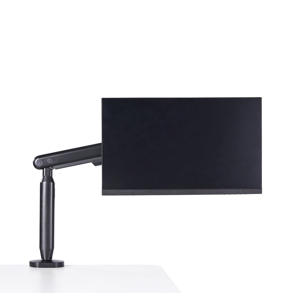 Hexcal Single Monitor Arm holds a monitor on a desk.