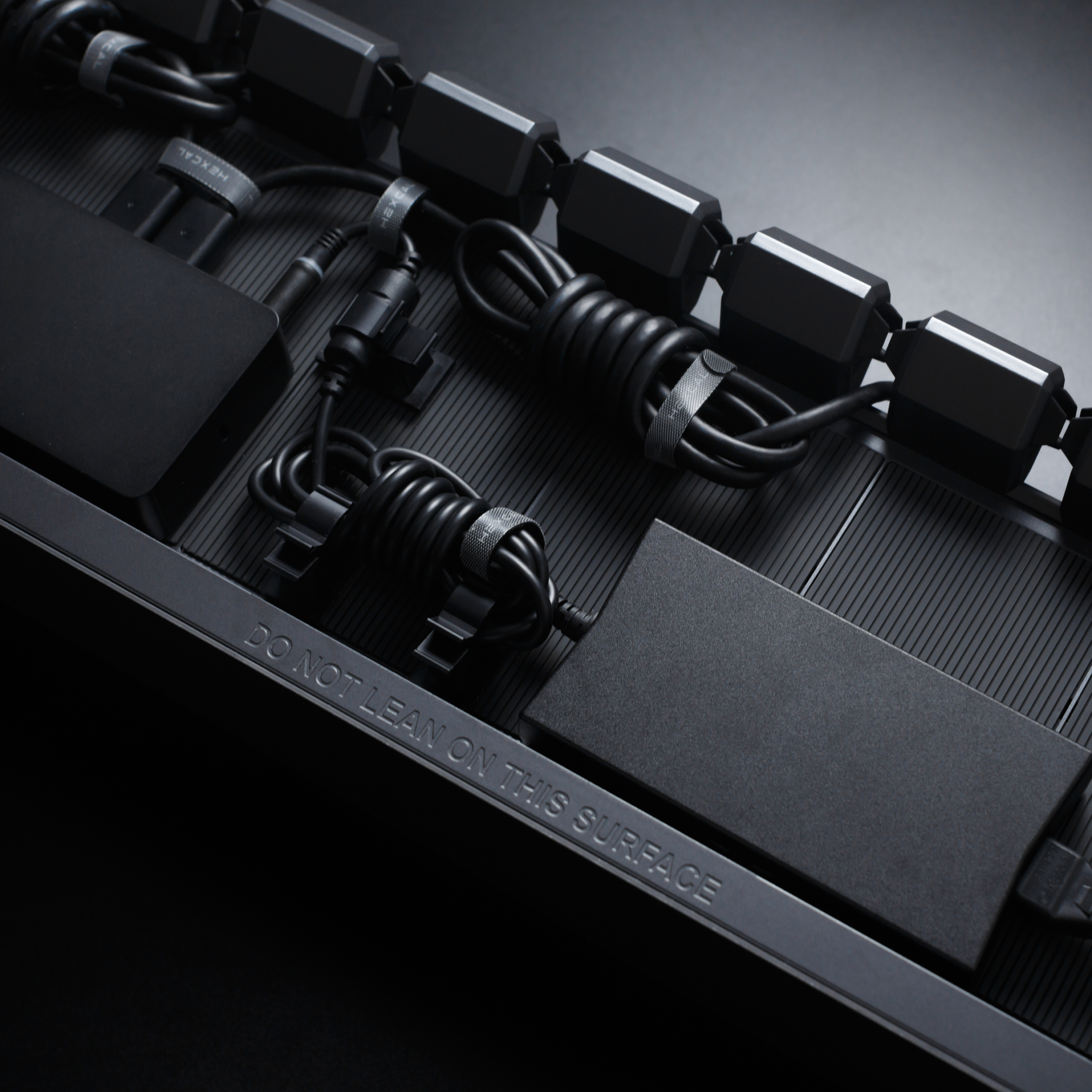 Hexcal Studio's innovative cable management solution to keep your desk organized and clean.