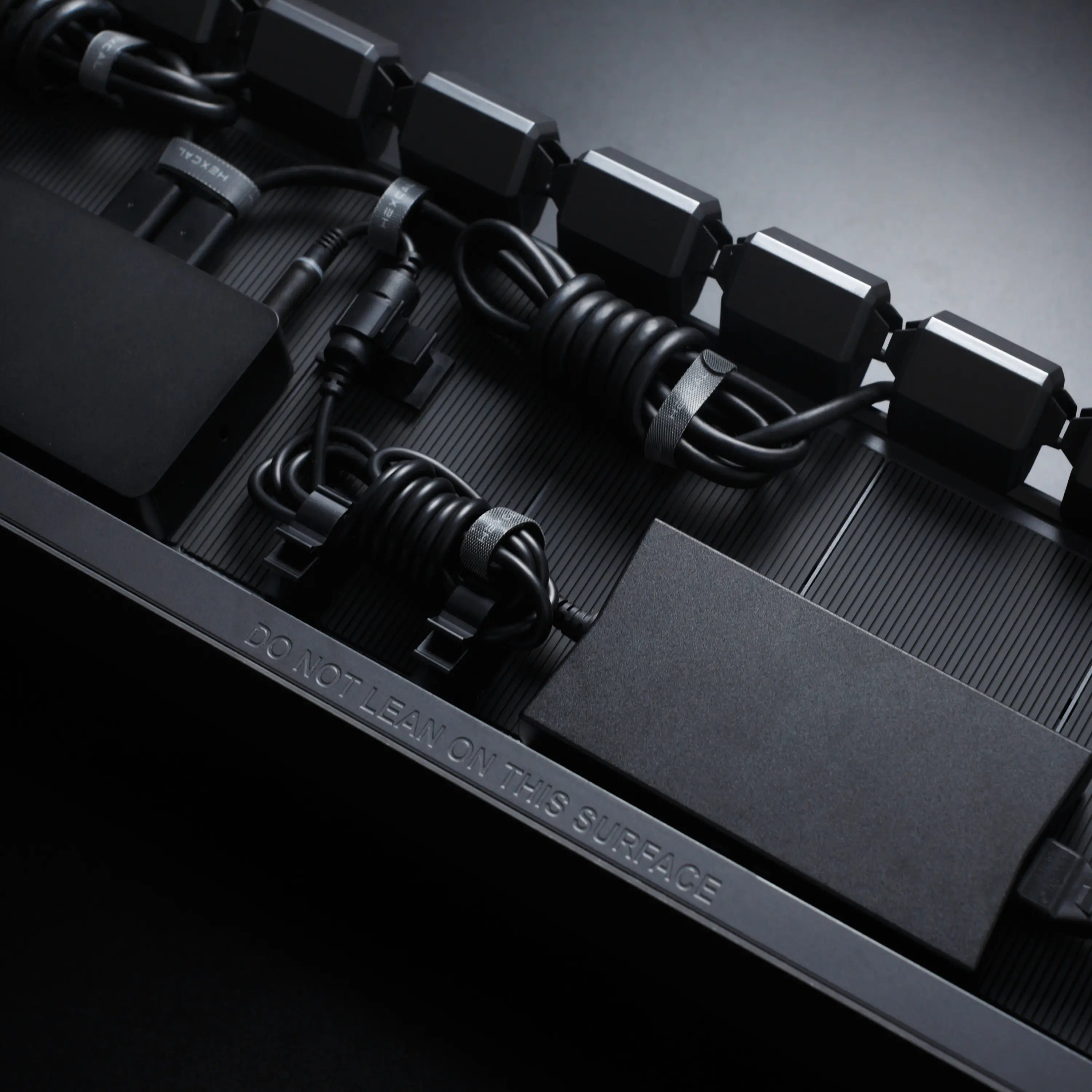 Hexcal Studio's innovative cable management solution to keep your desk organized and clean.