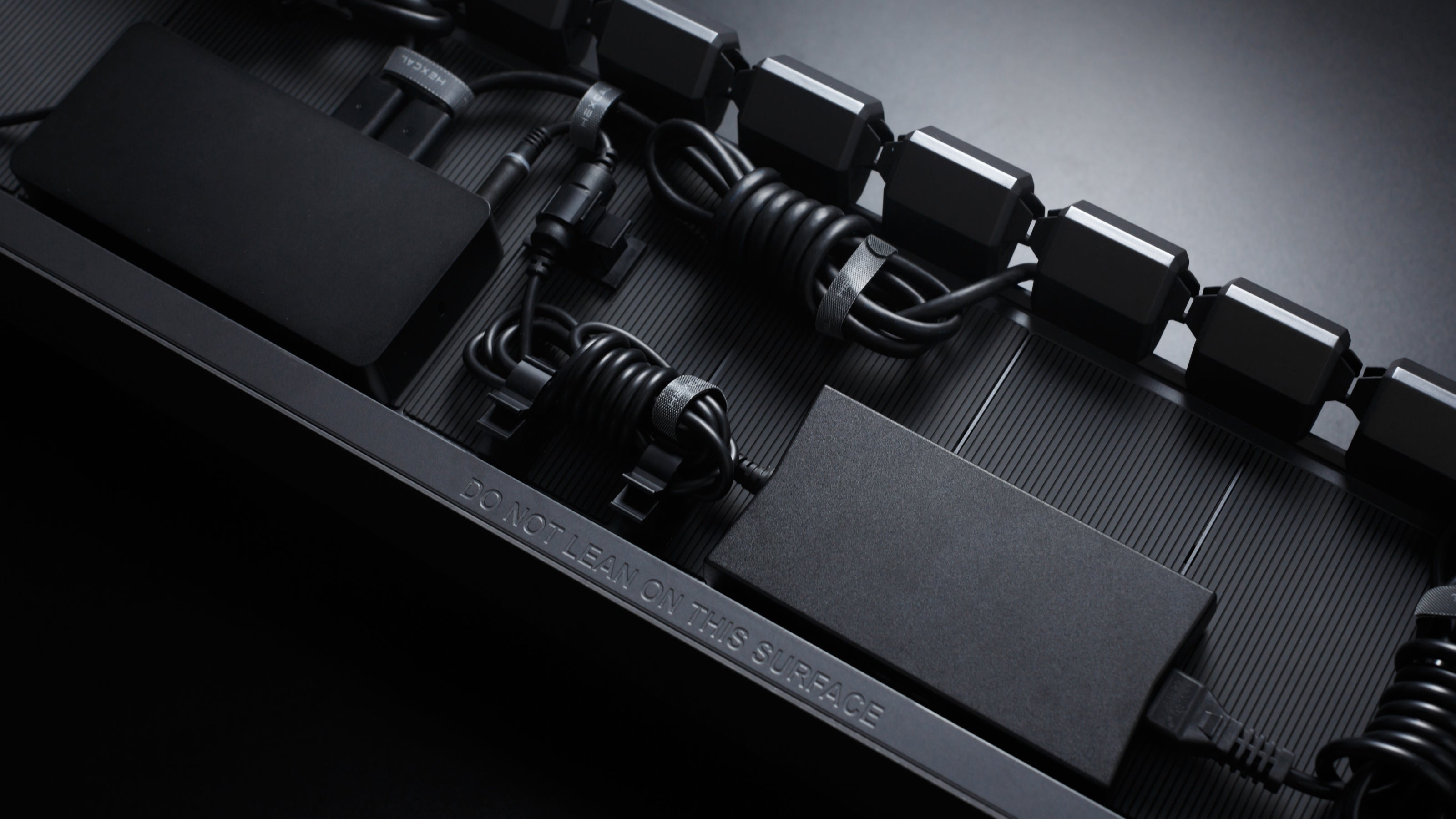 Hexcal Studio provides cable management design for your desk.