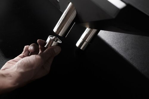 You can adjust the monitor stand's height by adding extension legs.