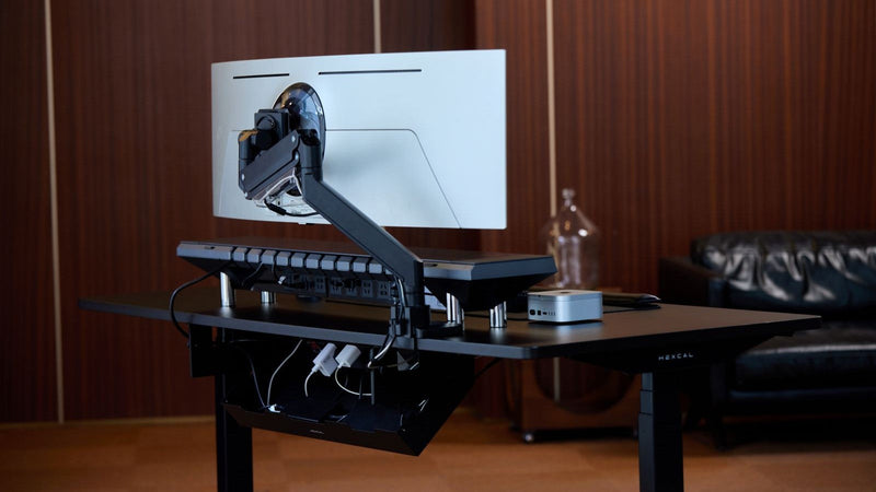 Hexcal Studio is a well-designed workspace solution that integrates cable management features seamlessly.