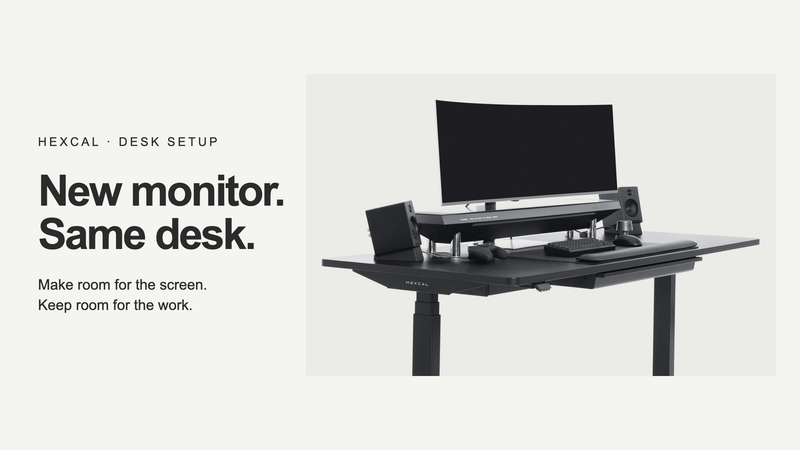 New monitor, same desk: a complete workstation showing a display, Studio platform, speakers and keyboard