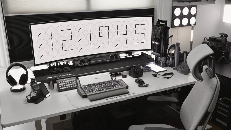 Clean desk cable management with concealed routing on a Hexcal Studio setup