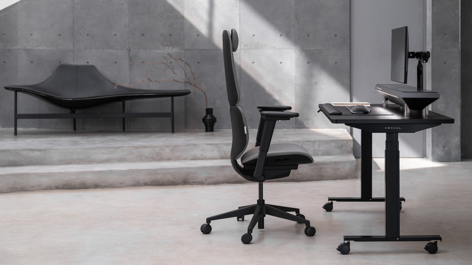 Hexcal collection includes standing desk system, ergonomic chair, monitor stand, monitor arm and other desk accessories.