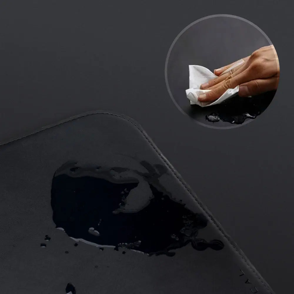 Hexcal Desk Mat waterproof vegan leather surface repelling liquid.
