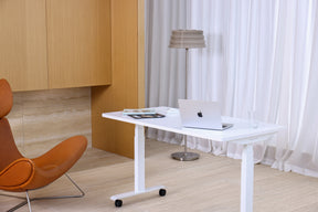 Hexcal Elevate Standing Desk white version in a home office scene
