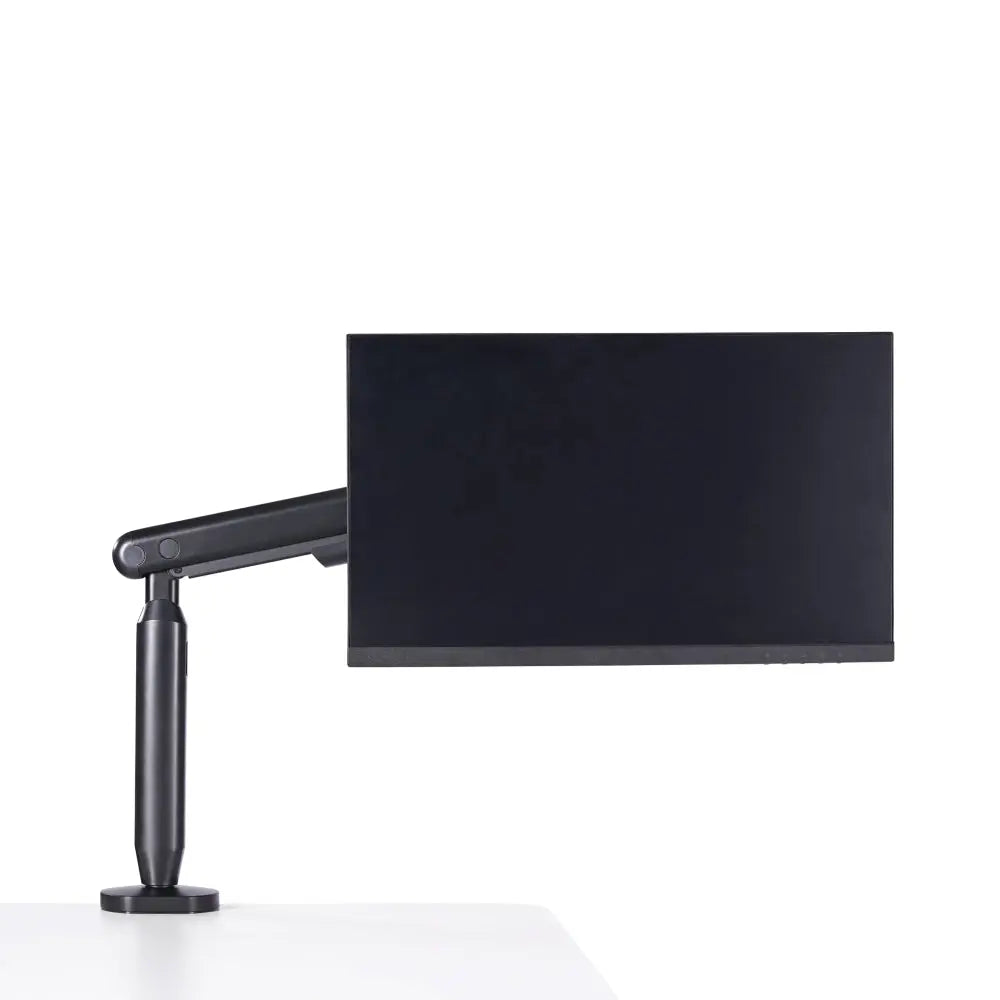 Hexcal Single Monitor Arm routing monitor cables behind a display