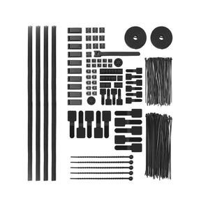 An assortment of black plastic tools from the Hexcal cable management kit, suitable for PC and household organization.